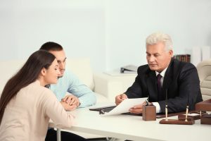 Lawyer talking to a couple