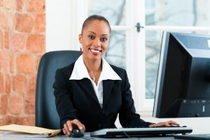 Female paralegal working on a computer