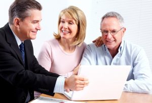 Senior couple consulting with lawyer