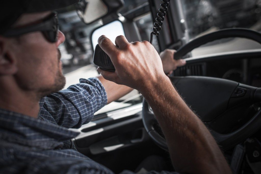 Truck driver speaking in the radio